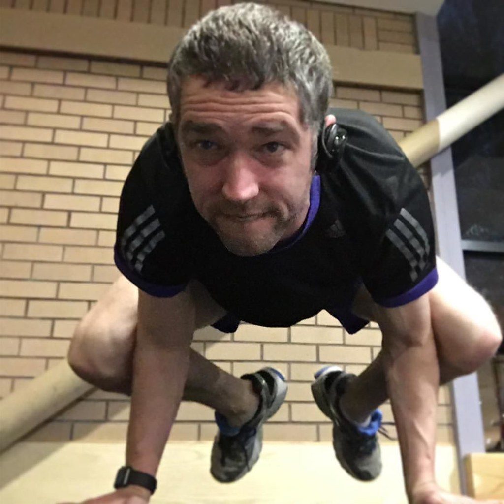 Man doing push-ups at home